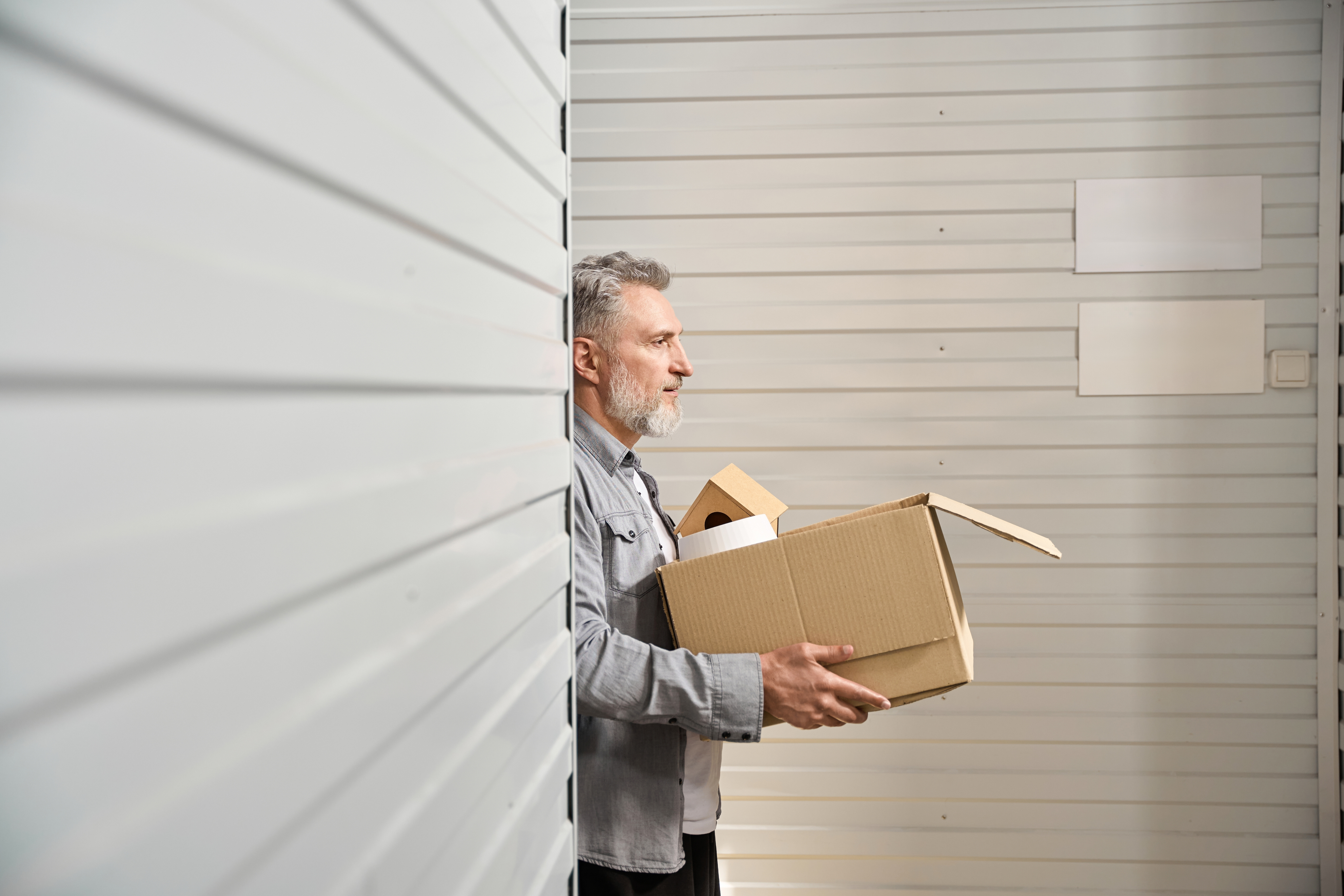 Image of a person carrying a box