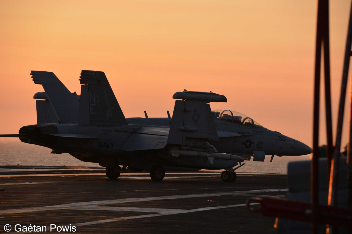 EA-18G Growler (folded wings) with its jamming pods and HARM anti-radar missile.