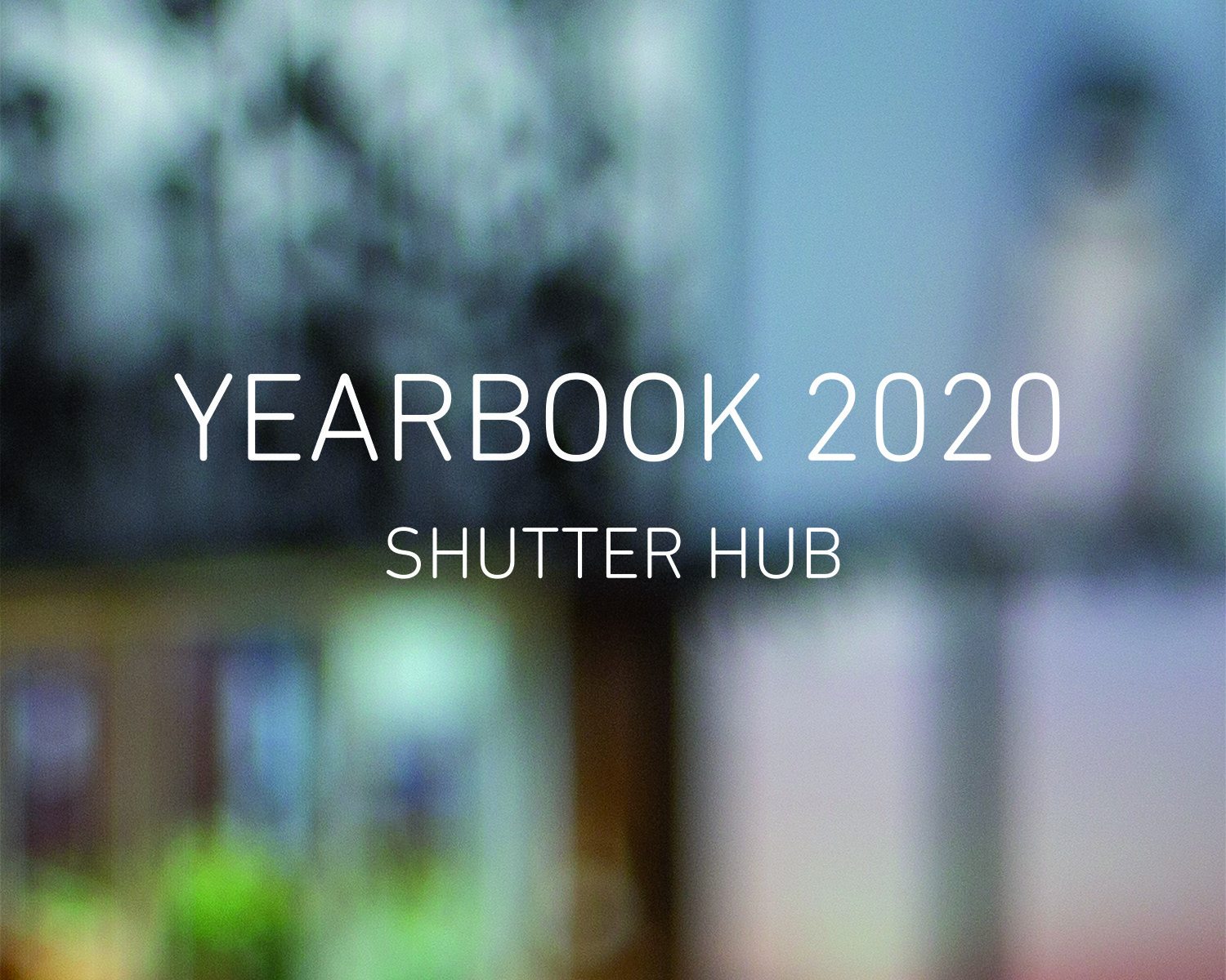 Text ready 'YEARBOOK 2020, SHUTTER HUB' on a background of an out of focus photograph of a screen showing an online exhibition.