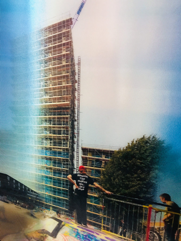 Photograph of lenticular print of tower block construction in South London