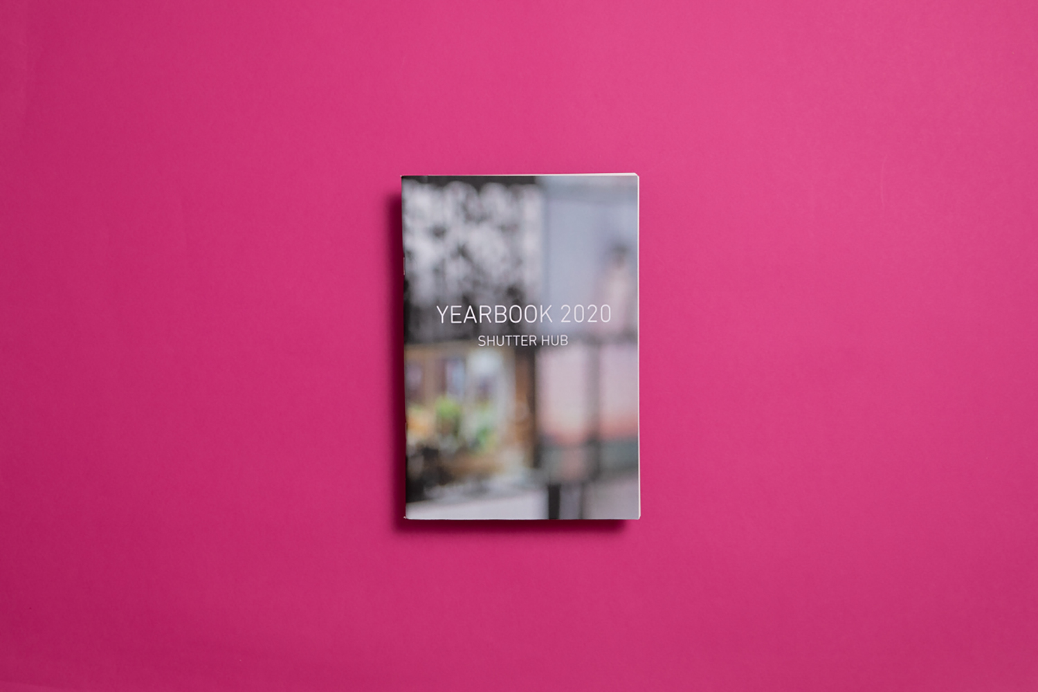 YEARBOOK 2020 printed publication on a pink background