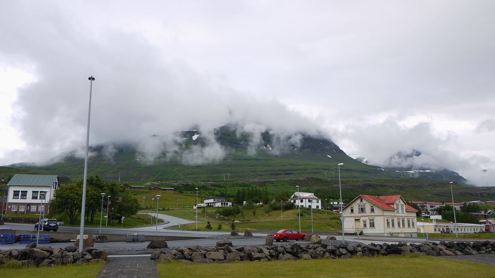 Reyðarfjörður fjord and town context near the Budara river walk.