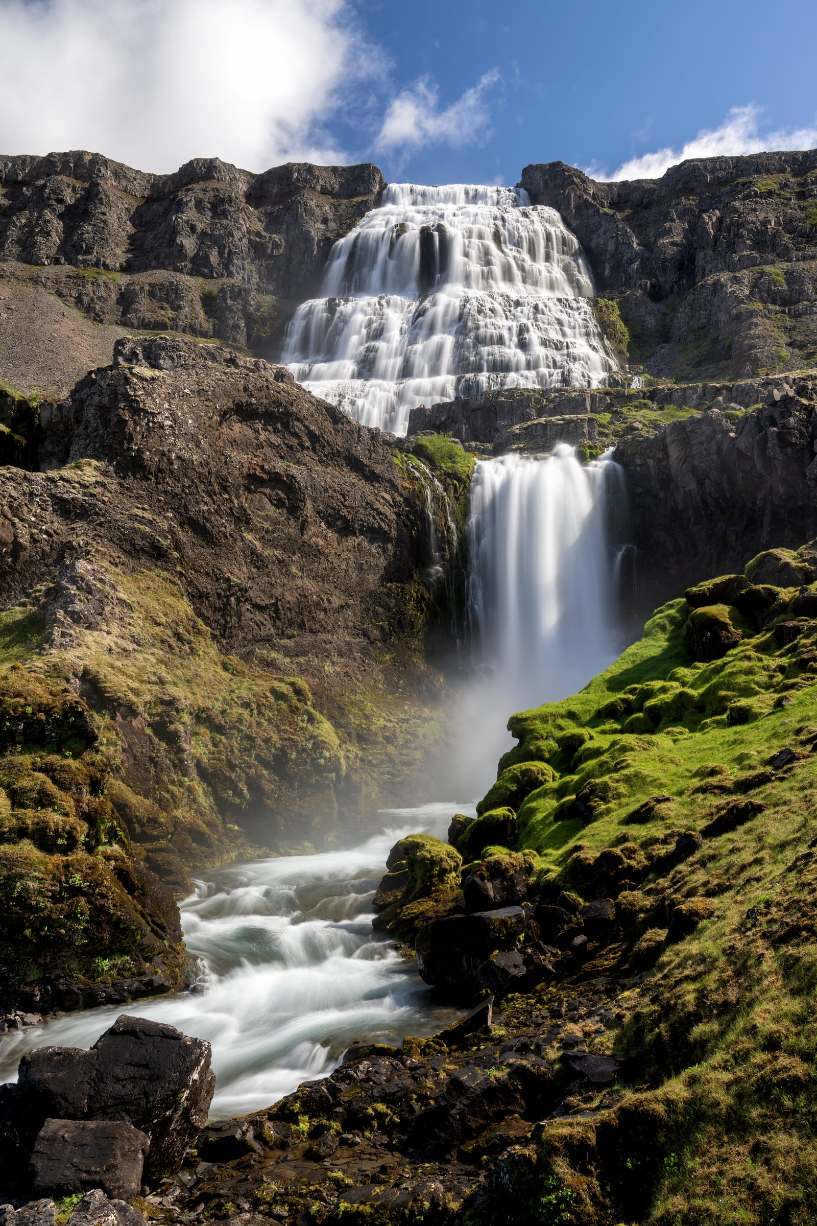 Uphill view below Dynjandi with lower watercourses leading toward the main waterfall.