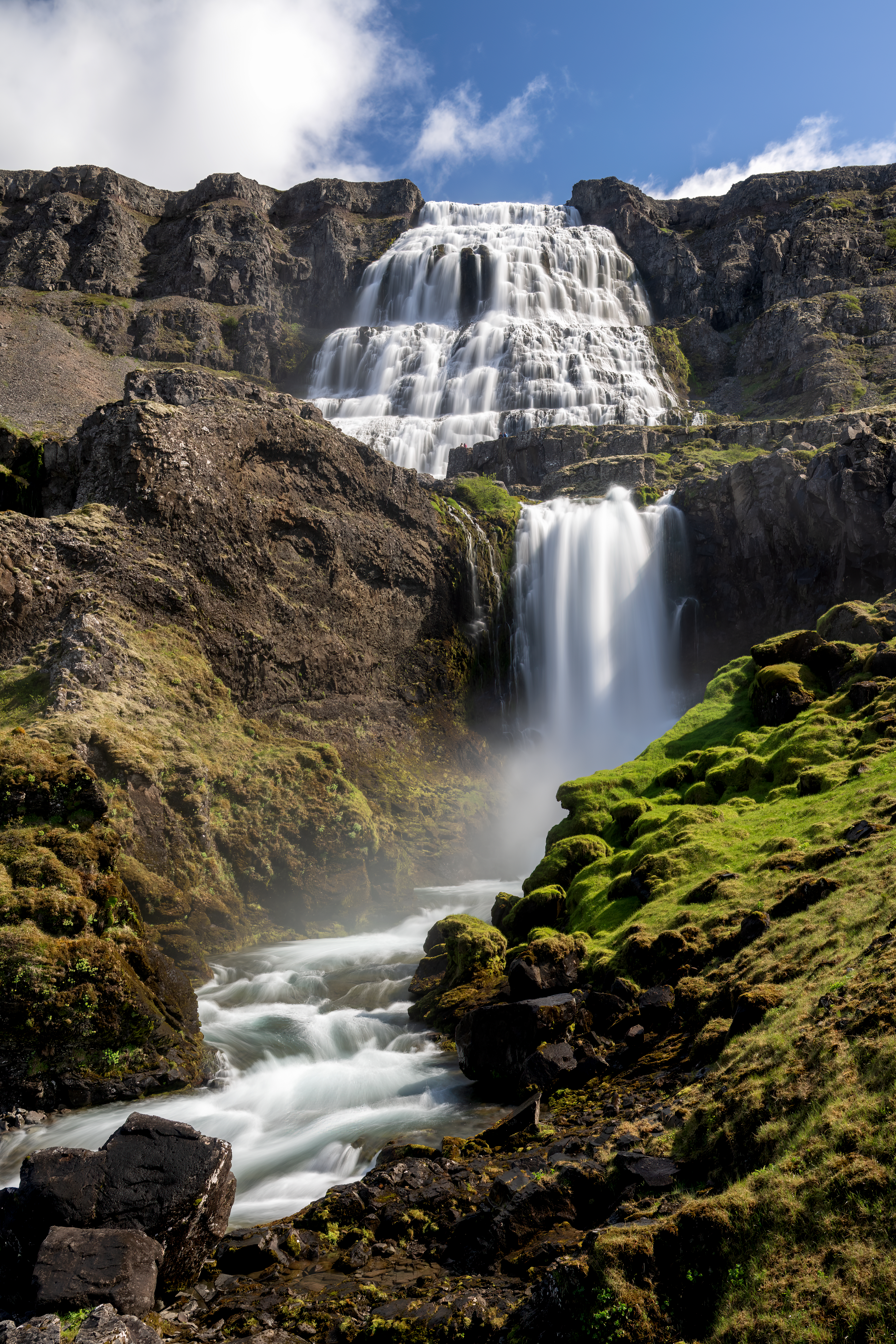 Uphill view below Dynjandi with lower watercourses leading toward the main waterfall.