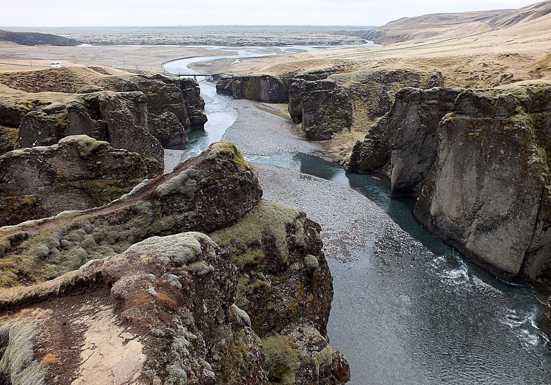 Fjaðrárgljúfur opening toward the lowlands as the Fjaðrá river leaves the steep canyon walls.