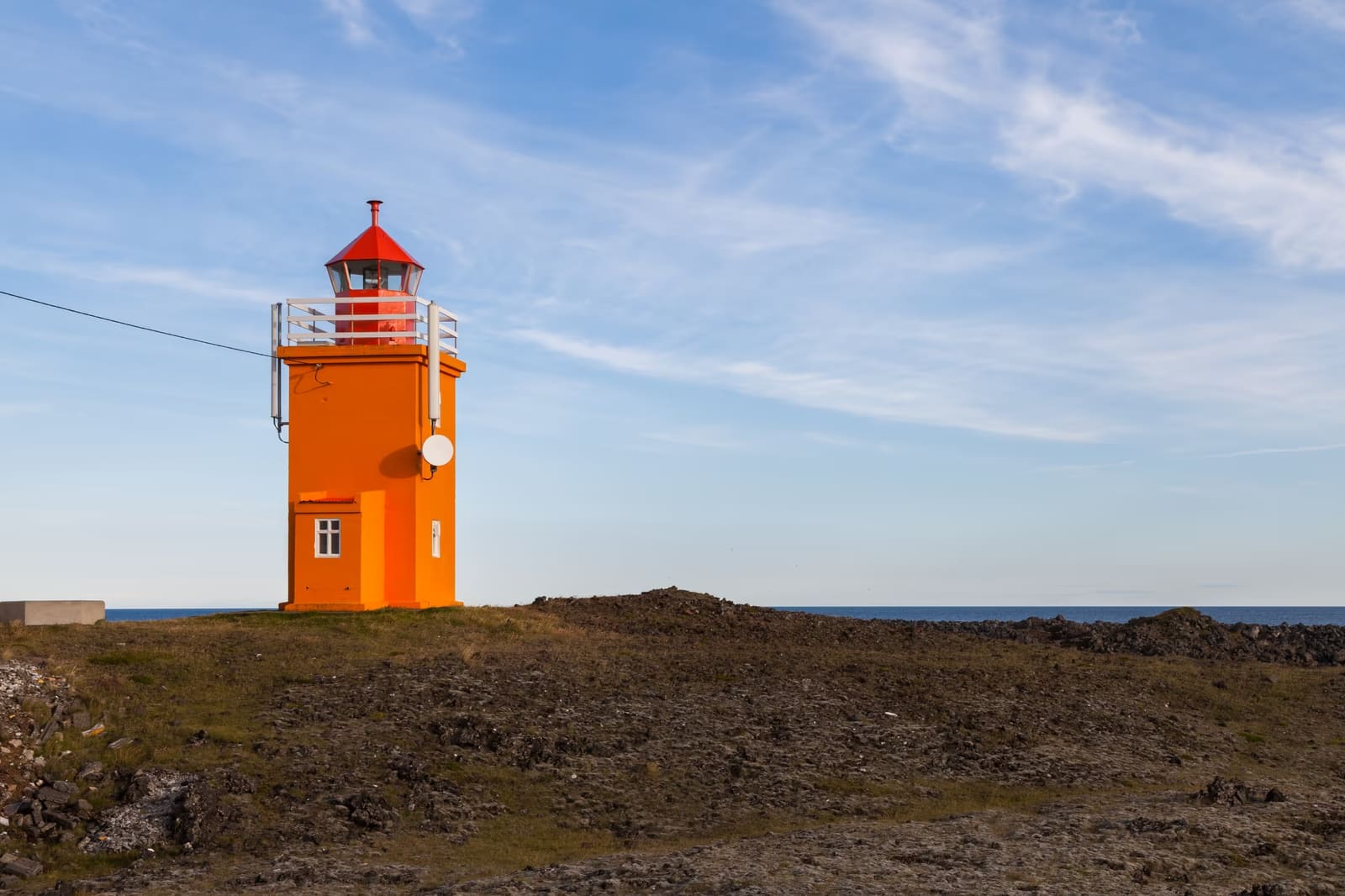 Hópsnesviti lighthouse on the rocky coast near Grindavík.