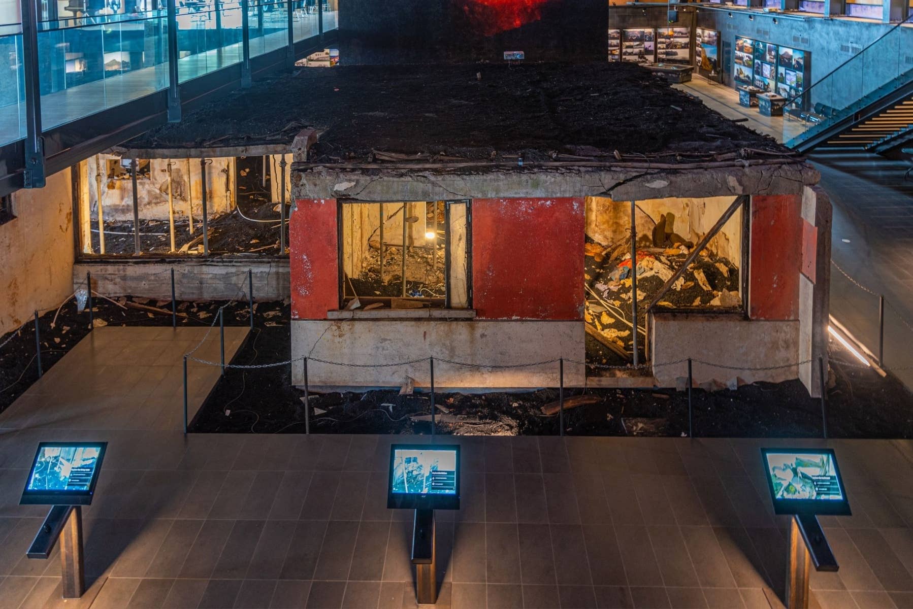 Eldheimar Museum display showing a Heimaey home preserved in volcanic ash.