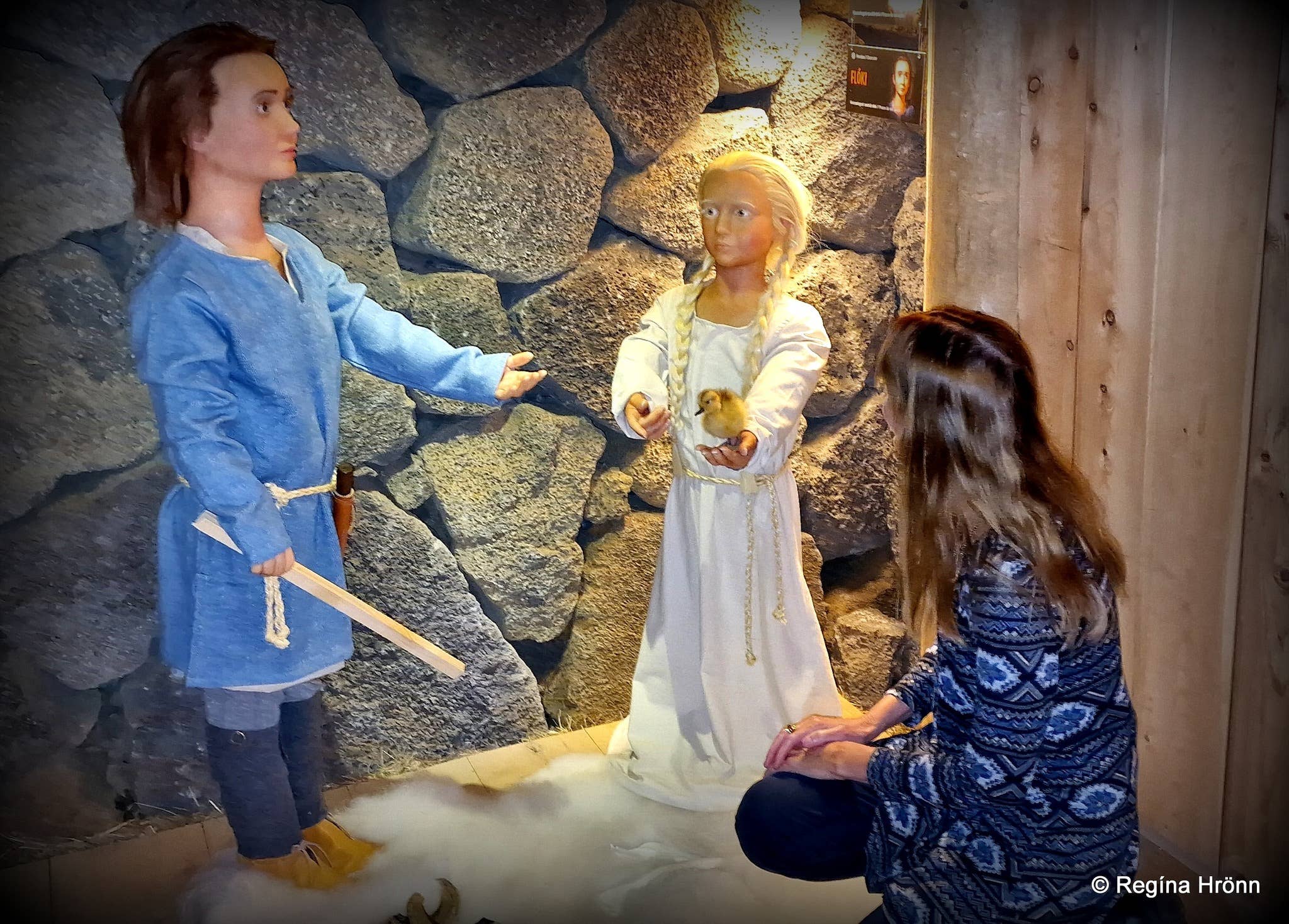 Viking figures and household scene inside Herjolfstown in Herjolfsdalur.