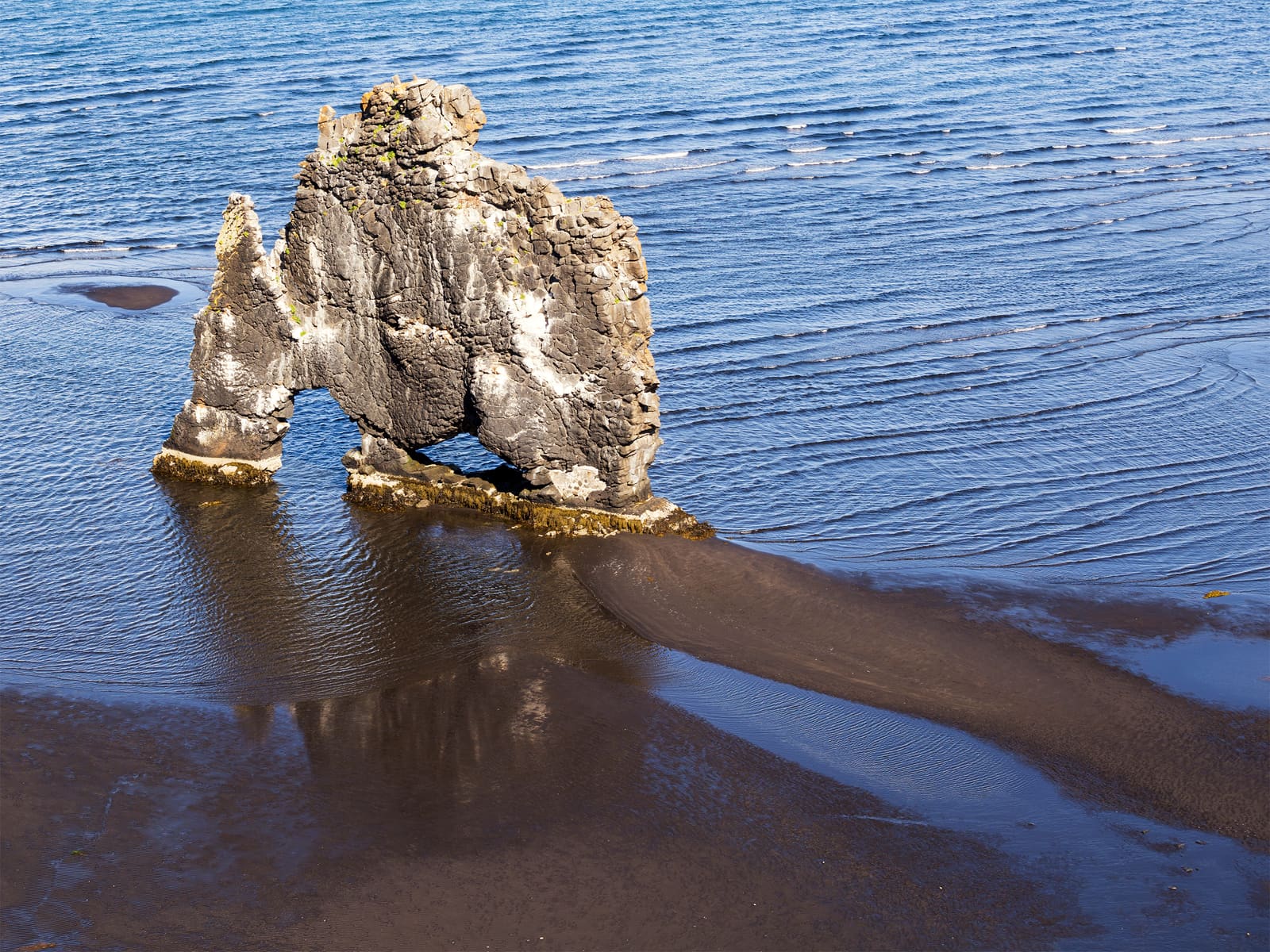 Hvítserkur sea stack on the Vatnsnes coast, a stronger nearby stop often paired with Hóp Lake.
