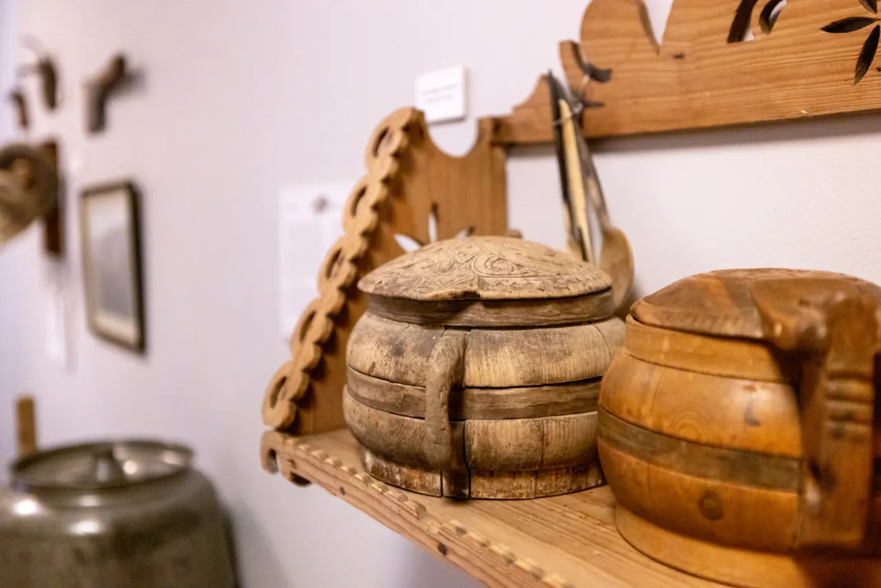 Wooden household objects displayed inside Husavik Museum.