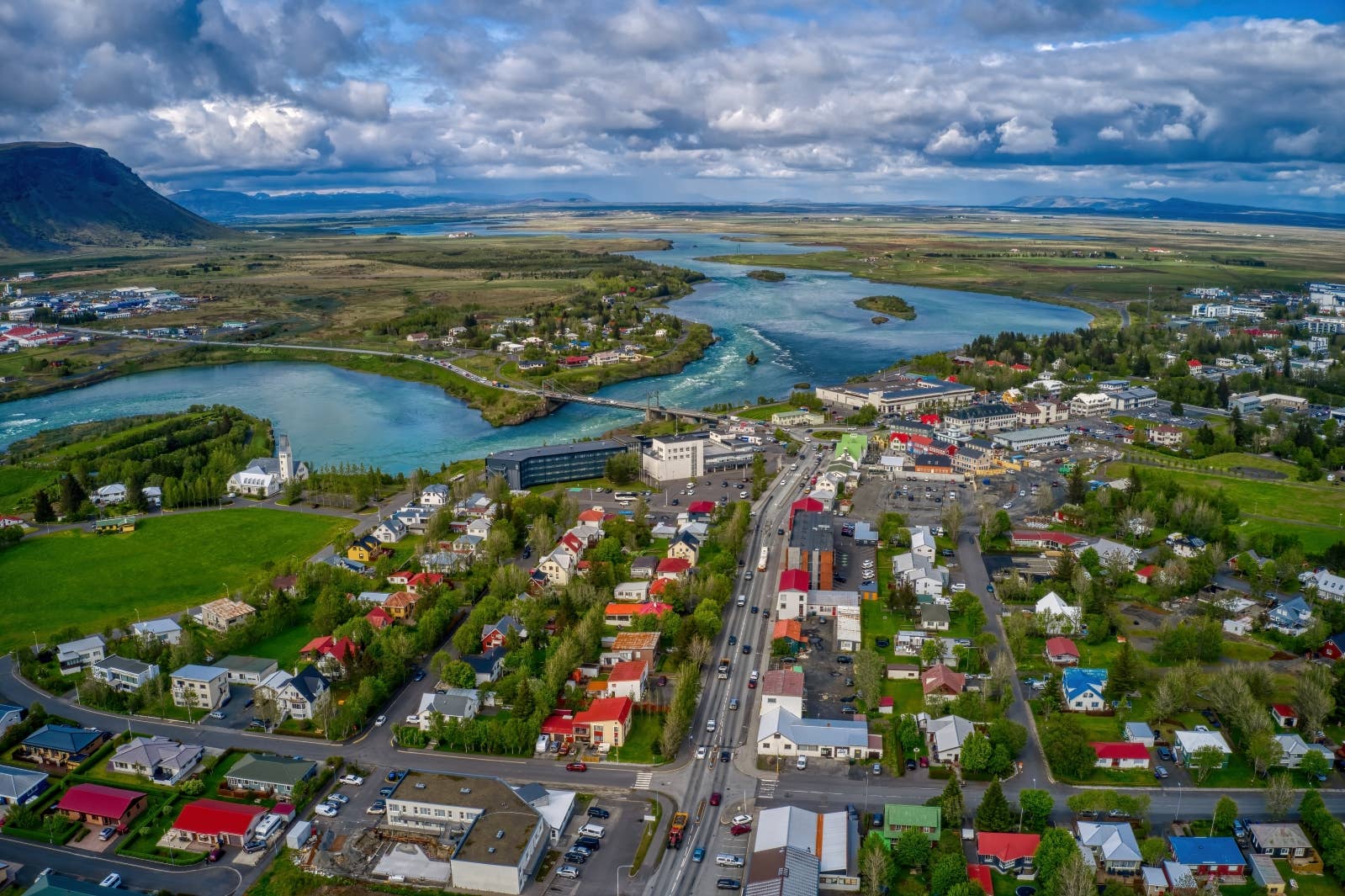 Selfoss, the Ölfusá river, and the wider South Iceland setting near Ingólfsfjall.