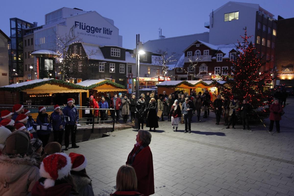 Ingólfstorg Square in Reykjavík with open public space and nearby downtown buildings.