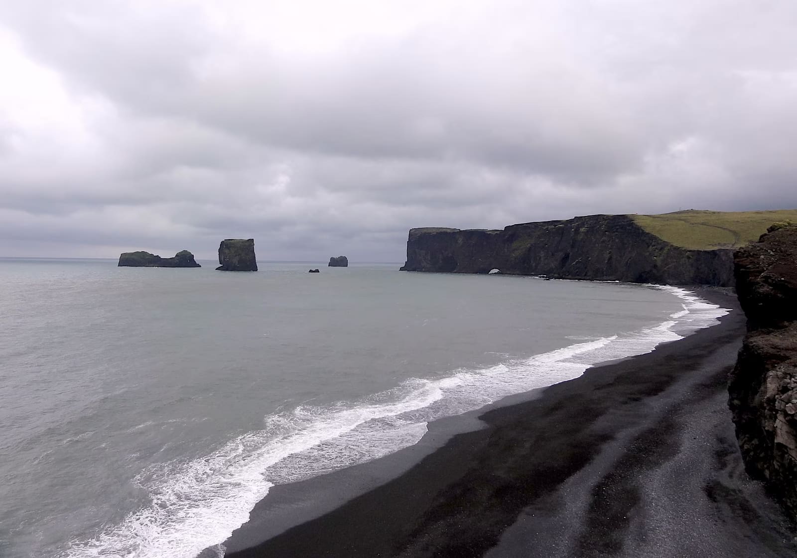 Kirkjufjara black sand beach below the Dyrhólaey cliffs on the South Coast.