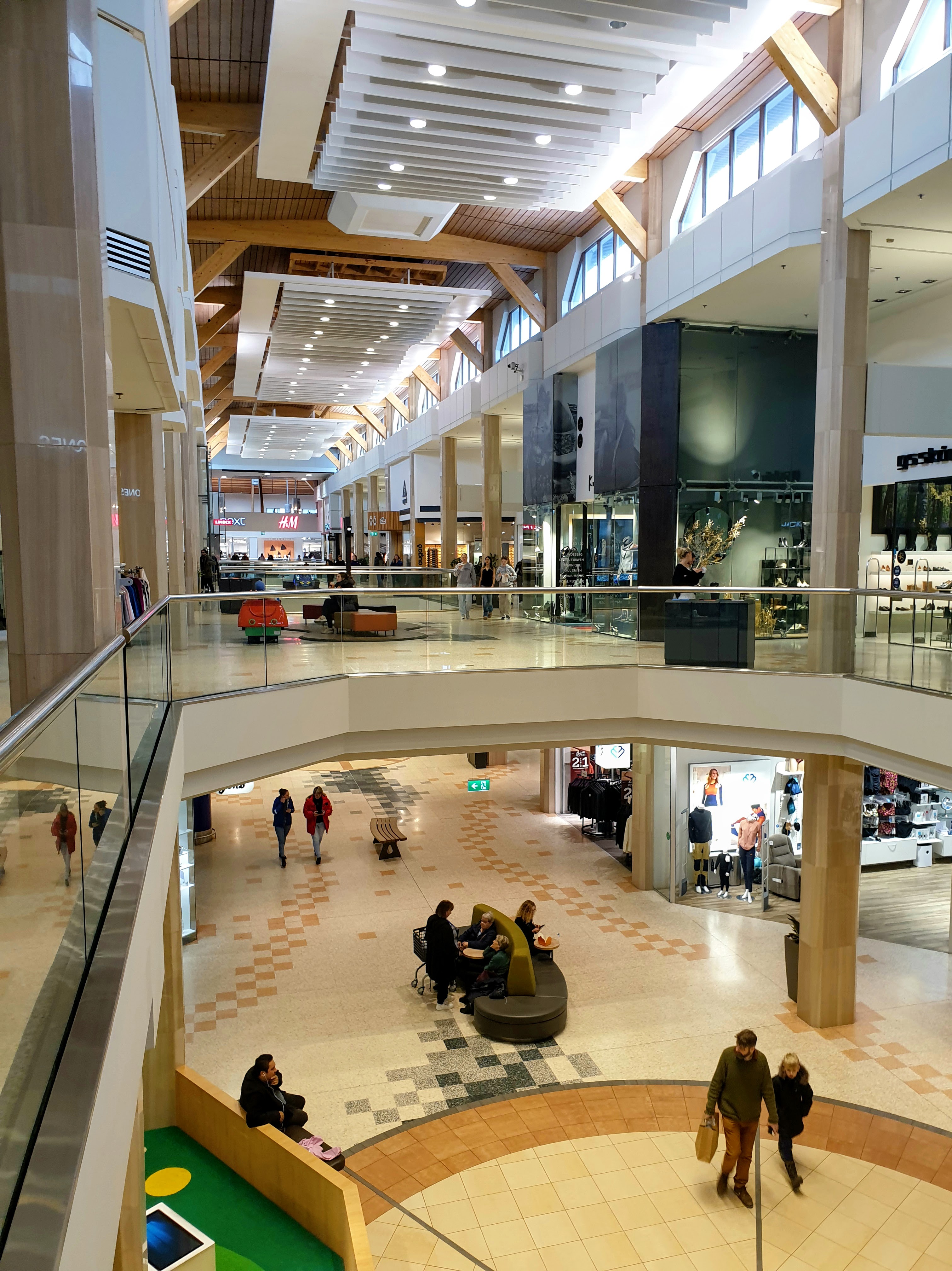 Upper-level interior walkway and open atrium inside Kringlan.
