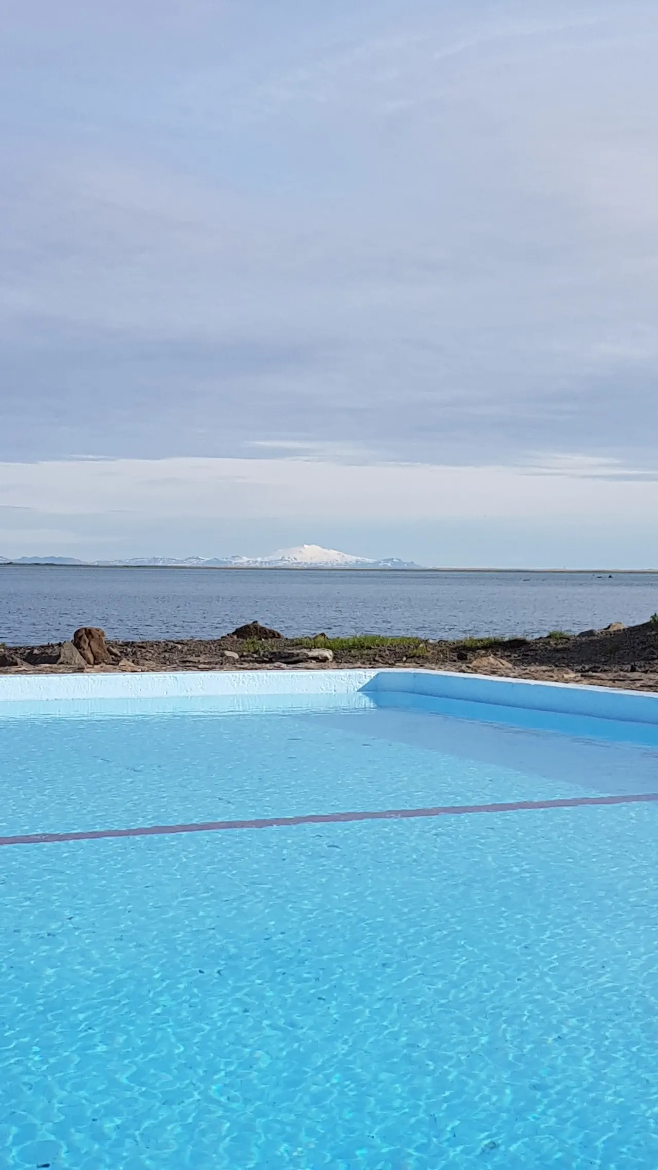 Small shore hot pot at Krosslaug beside the Barðaströnd coastline.