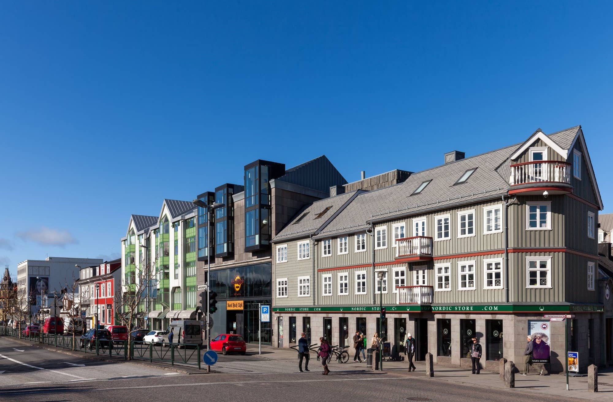 Old and newer buildings beside Lækjargata by the Lækjartorg walking area.