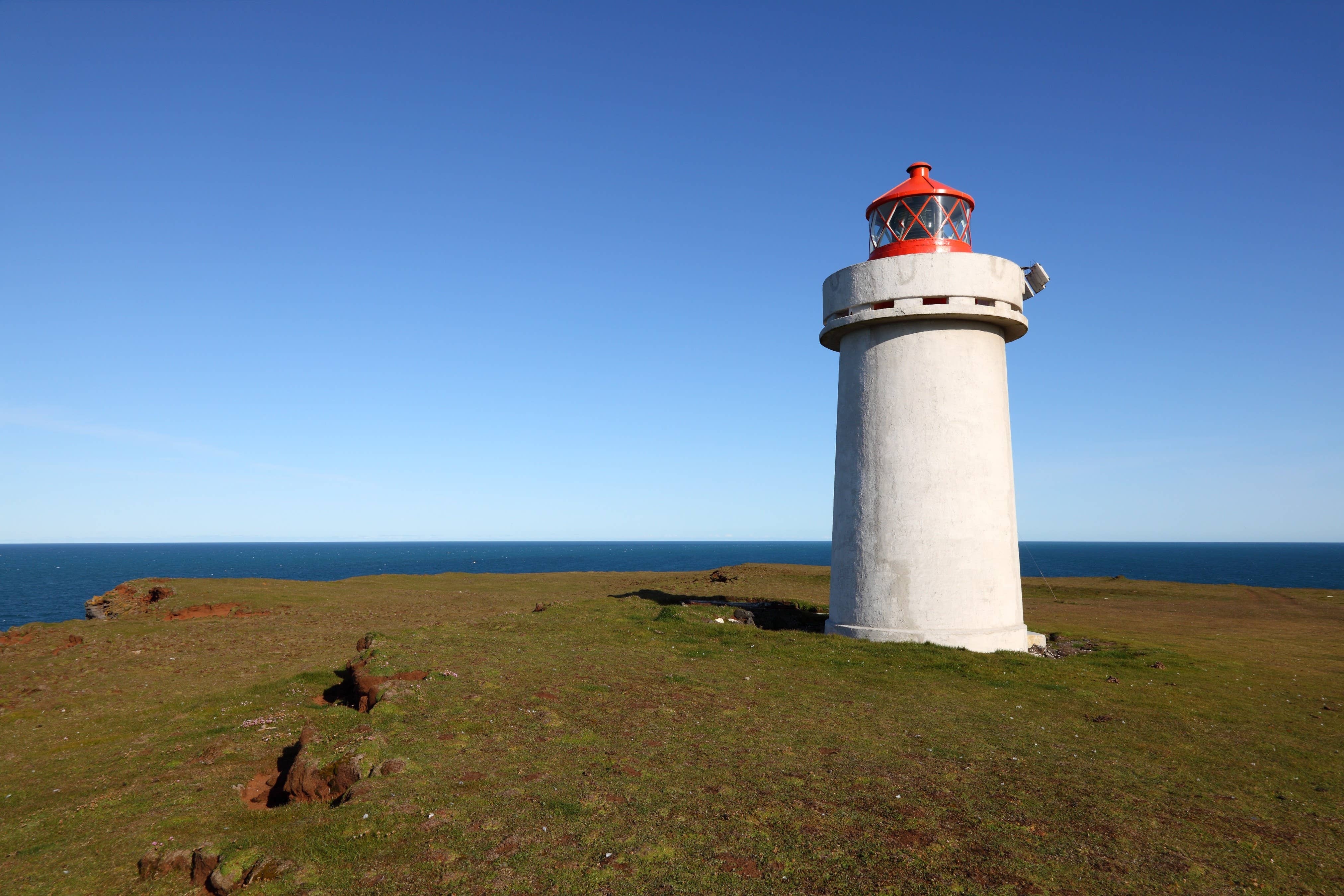 Close view of Fontur lighthouse at the outer end of Langanes Peninsula.
