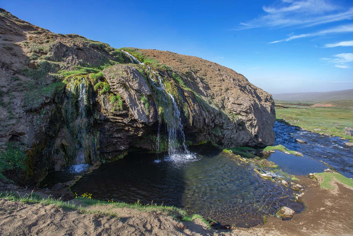 Laugavallalaug warm stream and natural pool area in the East Iceland highlands.