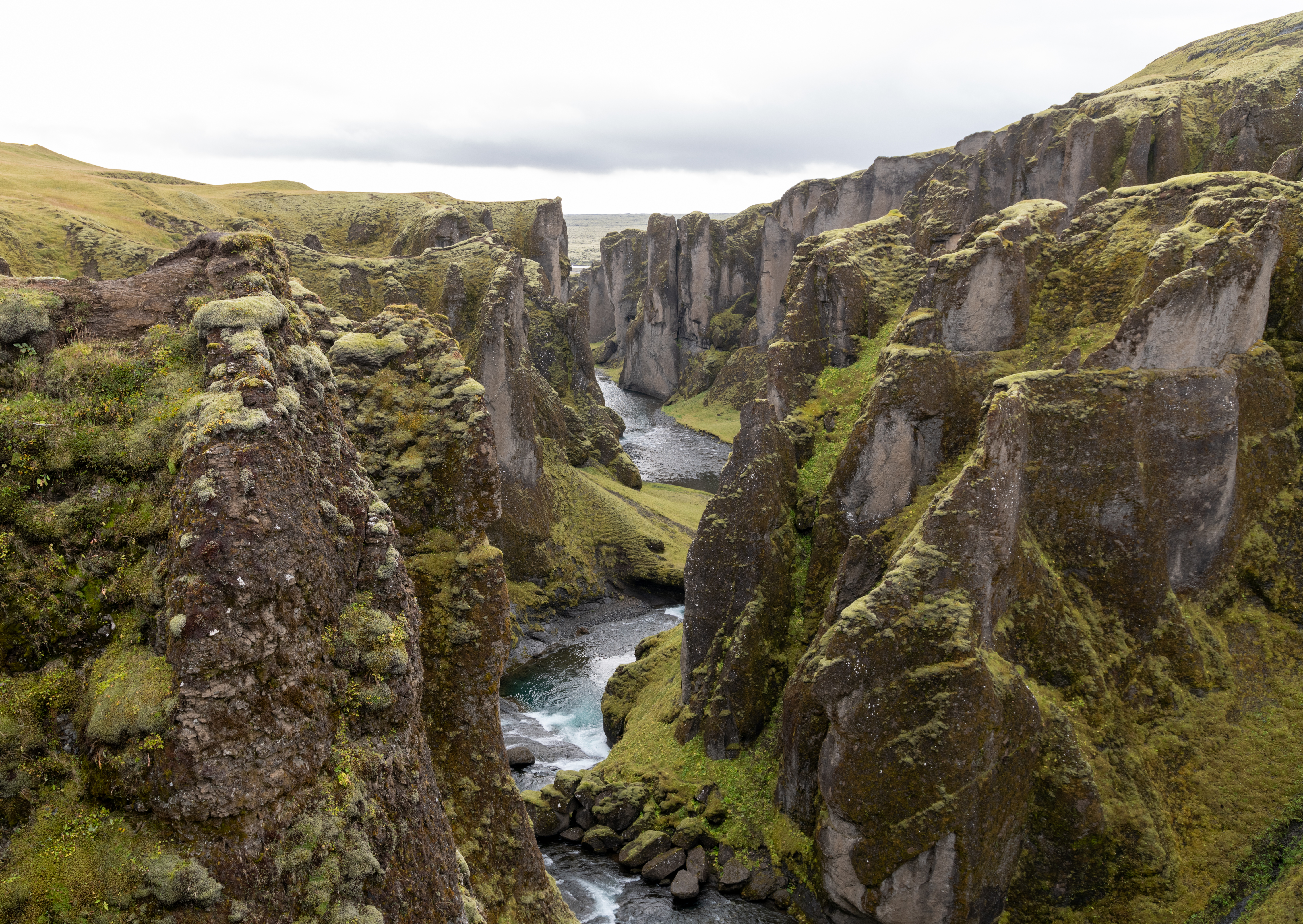 Upper Fjaðrárgljúfur canyon view showing steep terrain near the Mögáfoss viewpoint.