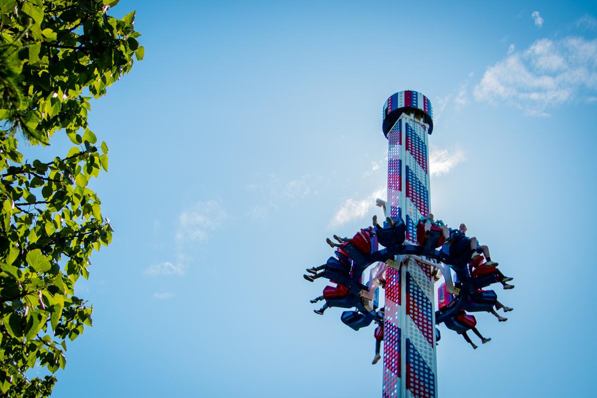 Drop-tower ride above trees at Reykjavík Family Park and Zoo