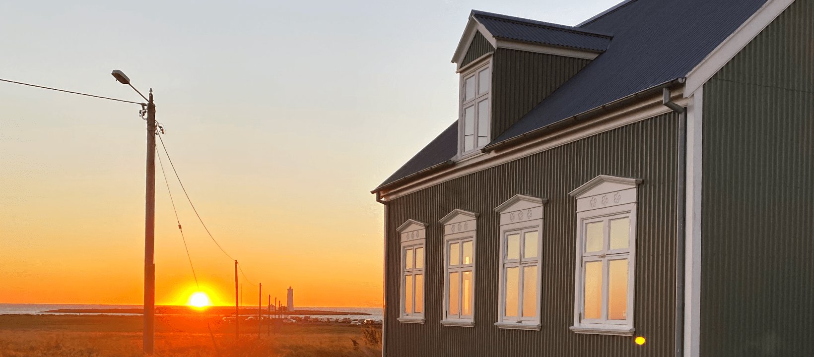 Ráðagerði timber building at sunset on the Seltjarnarnes coast