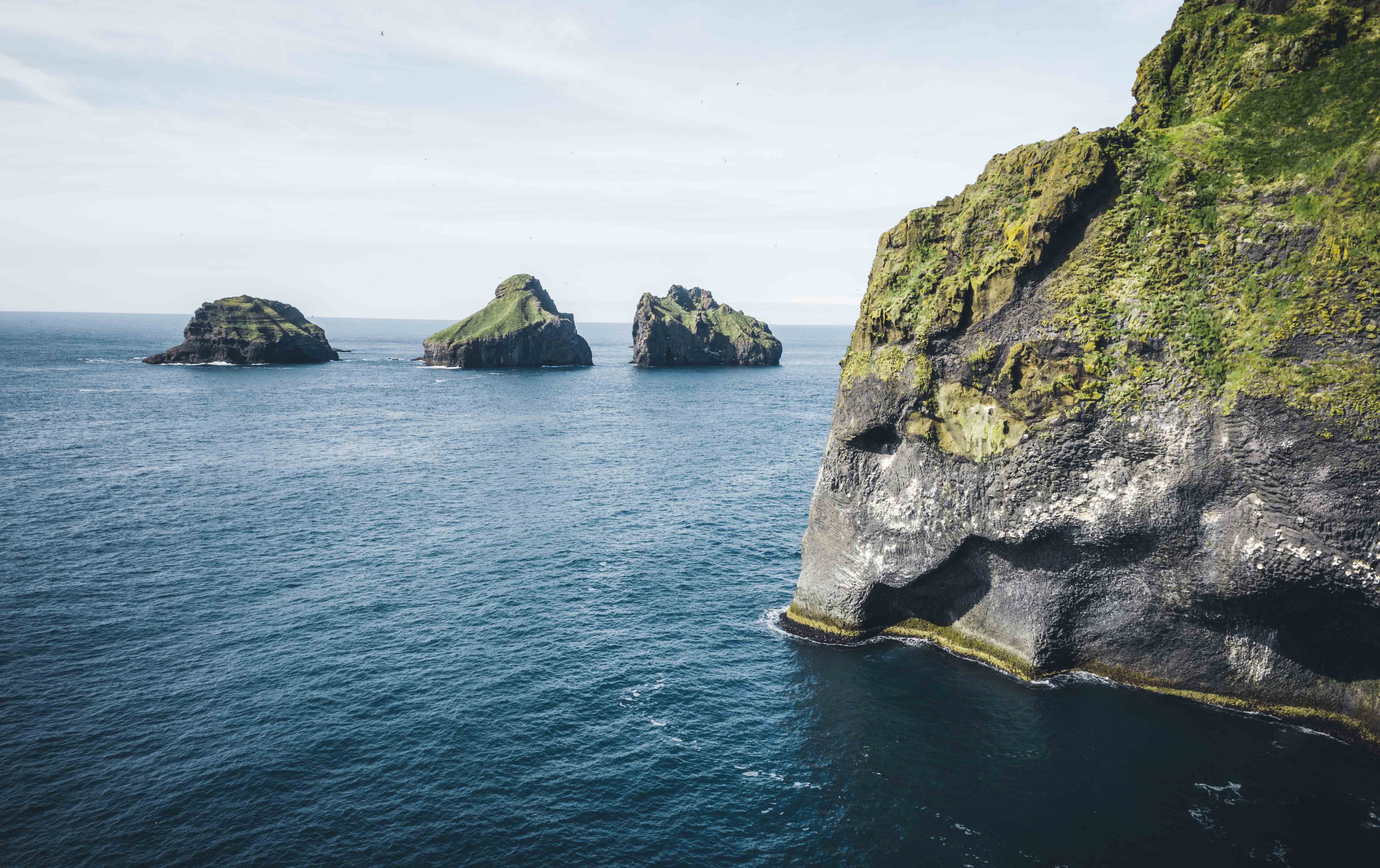 Wide view over Heimaey and the Westman Islands near Skansinn.