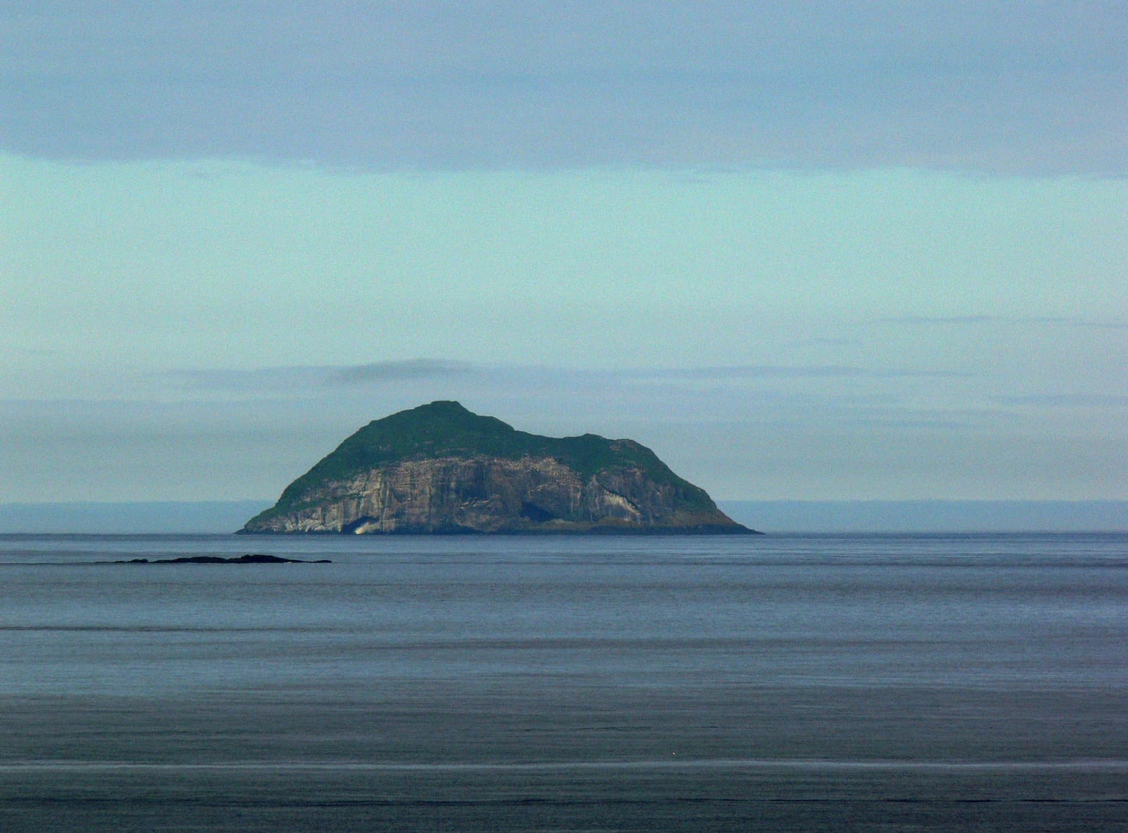 Skrúður island rising from the sea near Fáskrúðsfjörður in East Iceland.