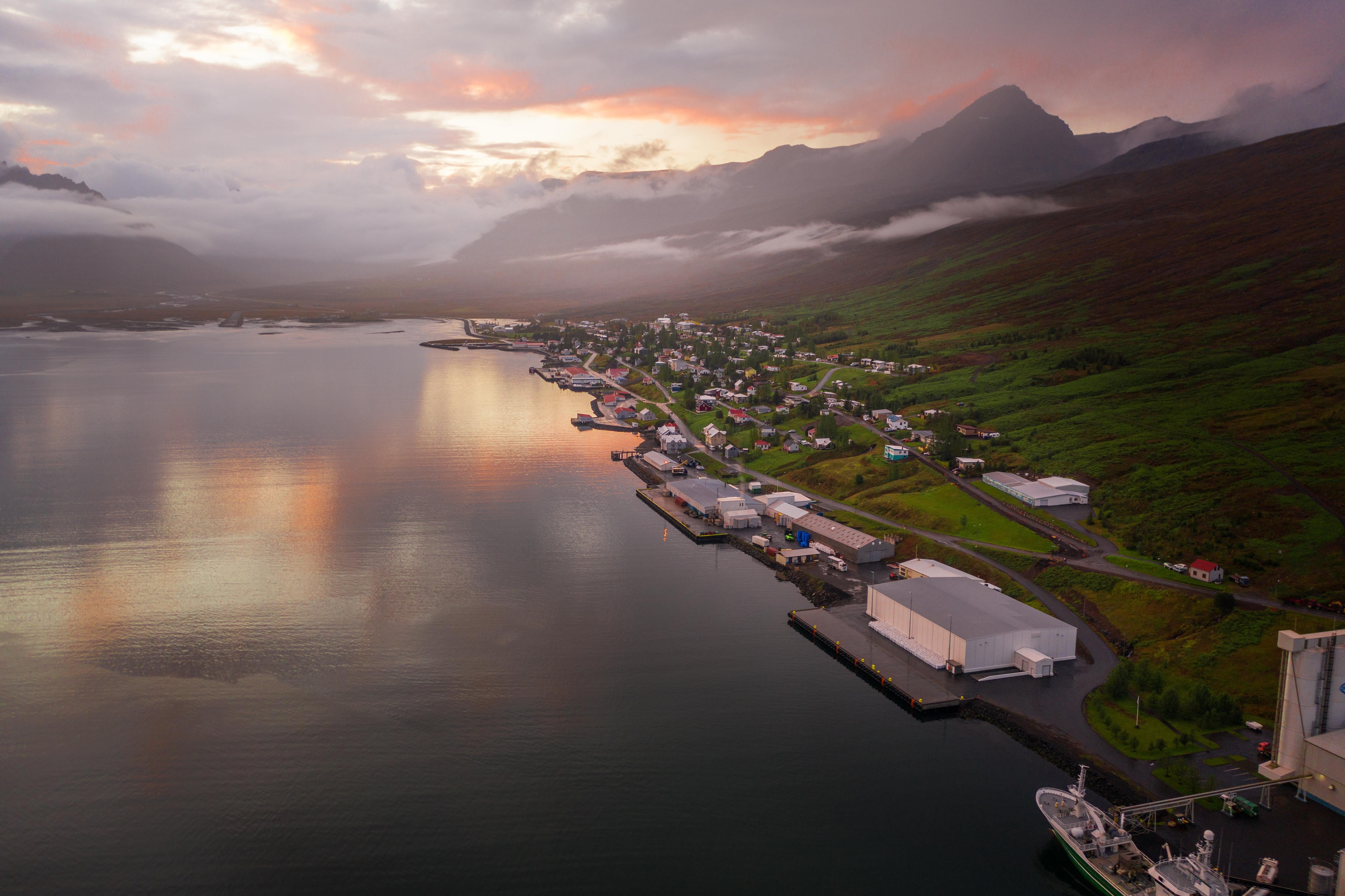 Fáskrúðsfjörður village and fjord surrounded by East Iceland mountains.