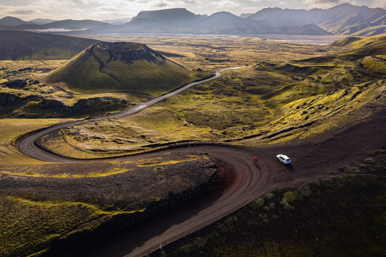 Highland road through volcanic hills on the approach to the Sudurnamur and Landmannalaugar area.