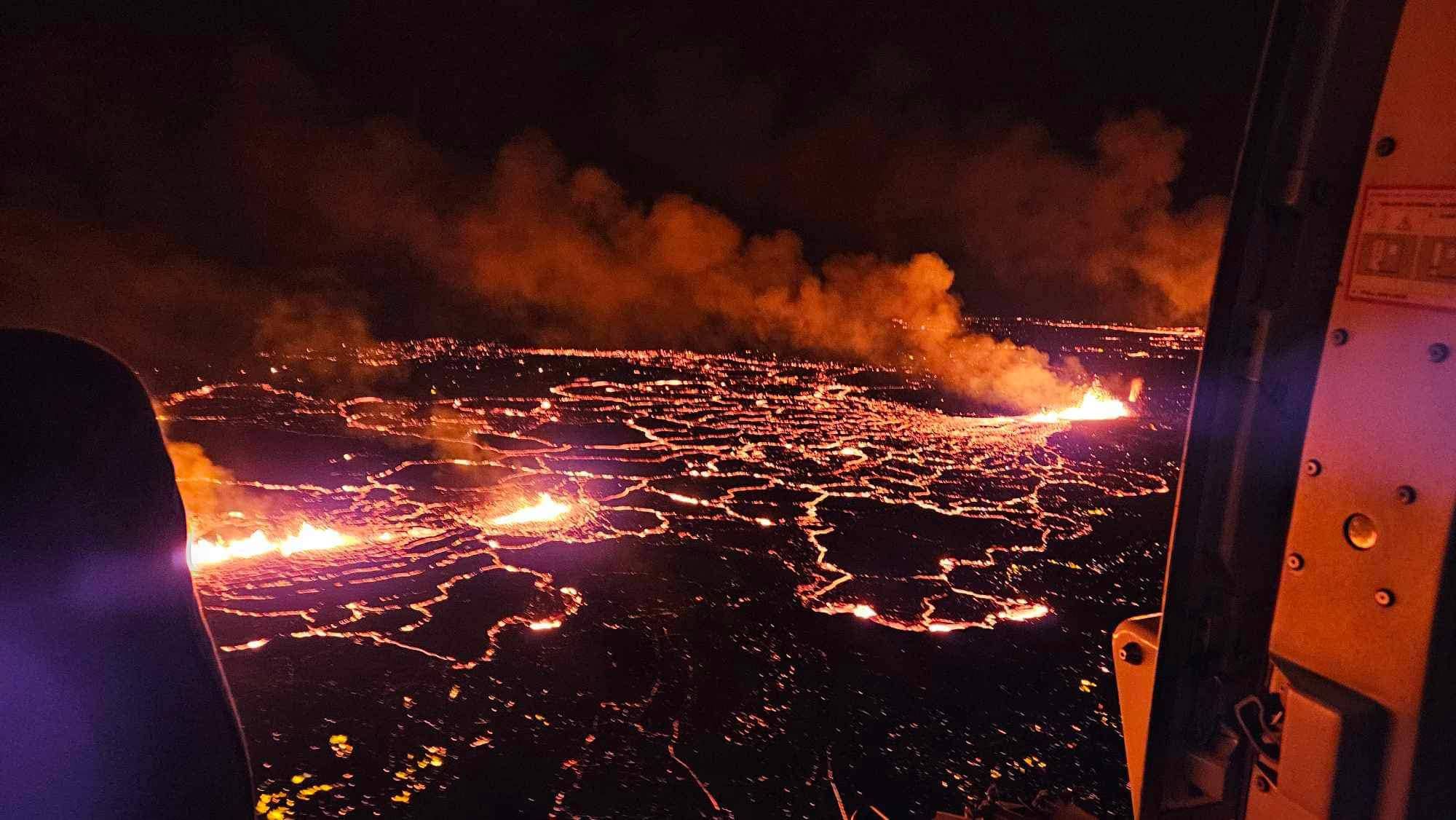 Aerial view of a Sundhnúkagígar eruption lighting the Reykjanes lava field.