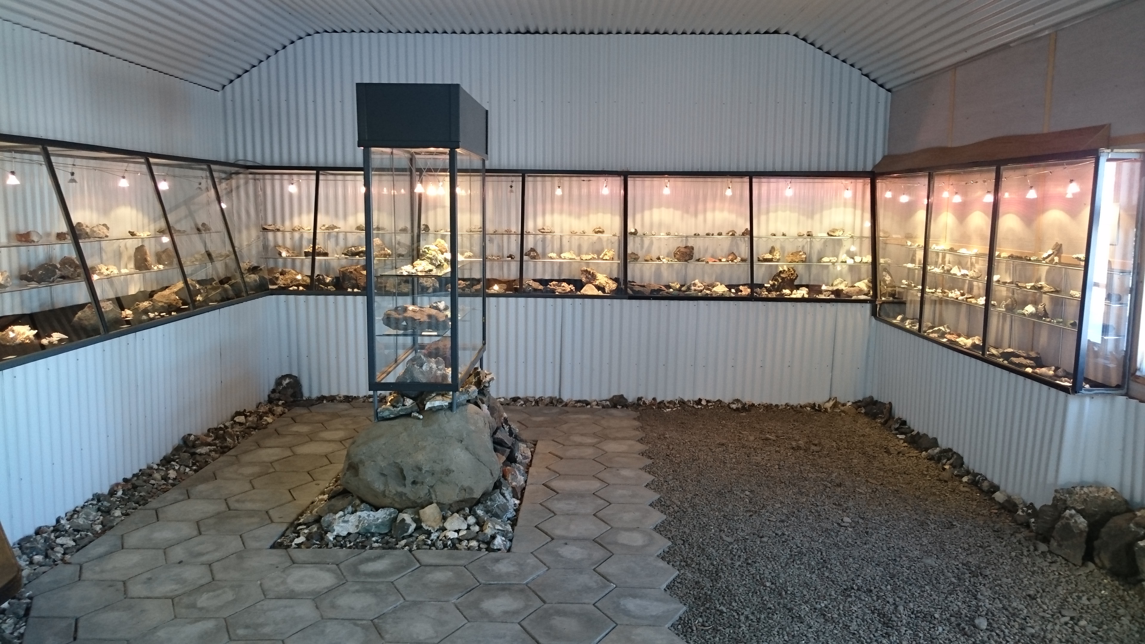 Mineral display cases inside the Teigarhorn Stone Collection