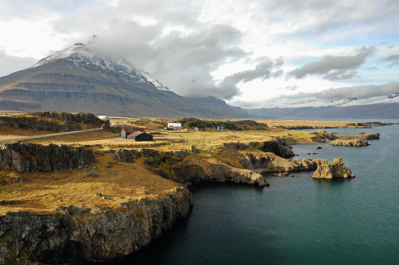 Teigarhorn cliffs and coastline beside Berufjörður in East Iceland