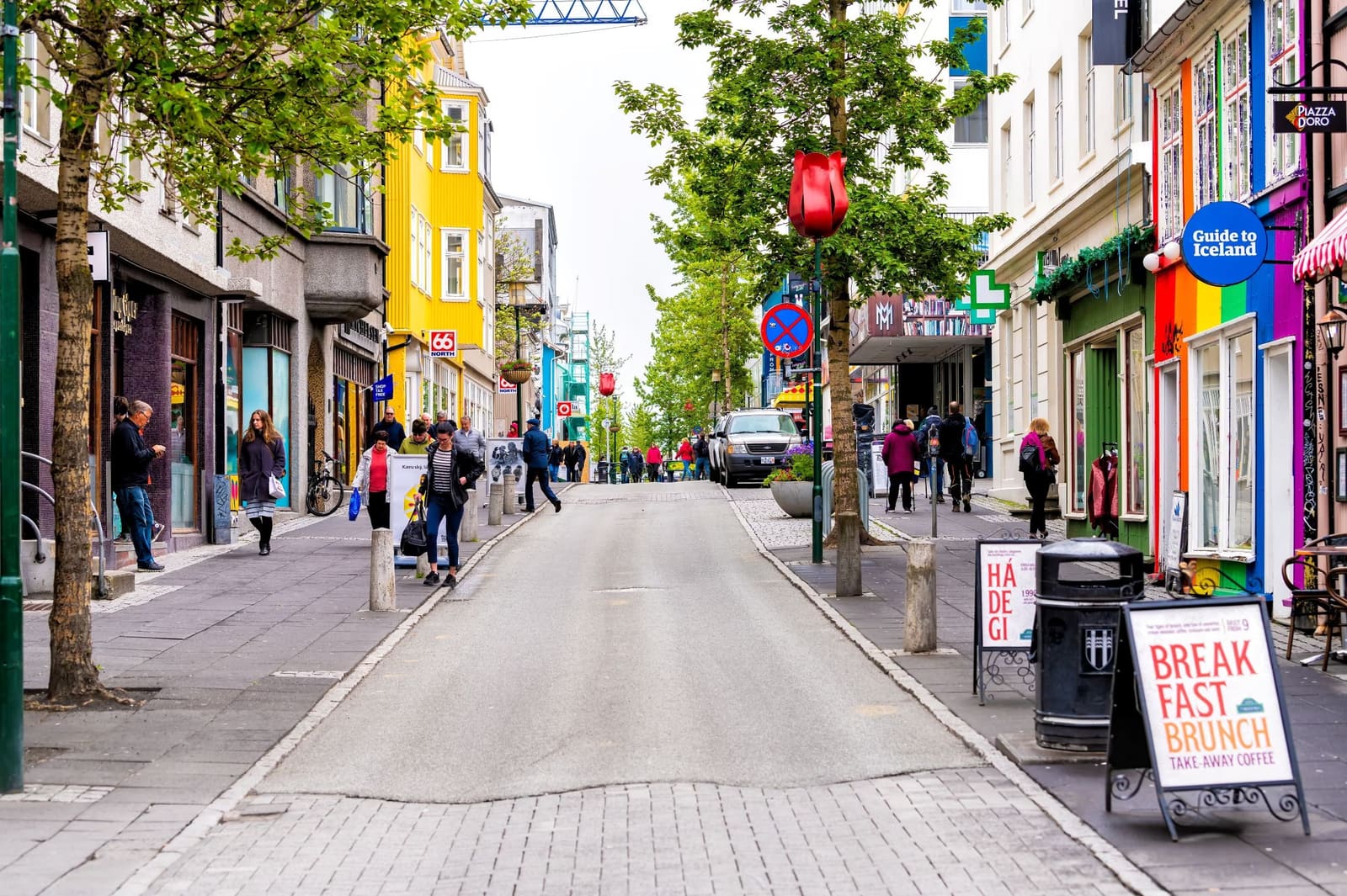 Downtown Reykjavík street life on Laugavegur close to the Punk Museum area