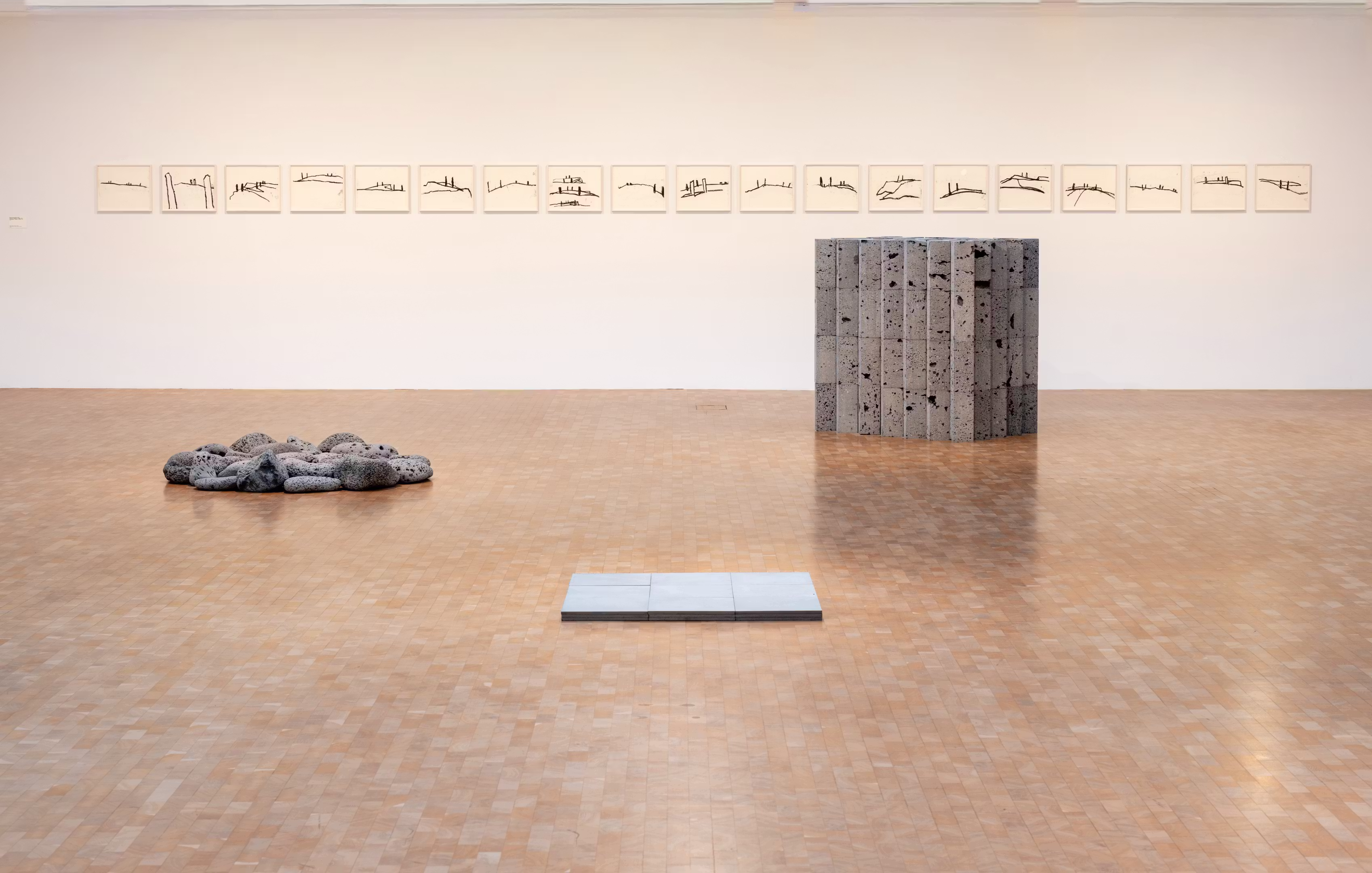 A spacious exhibition room inside the National Gallery of Iceland.