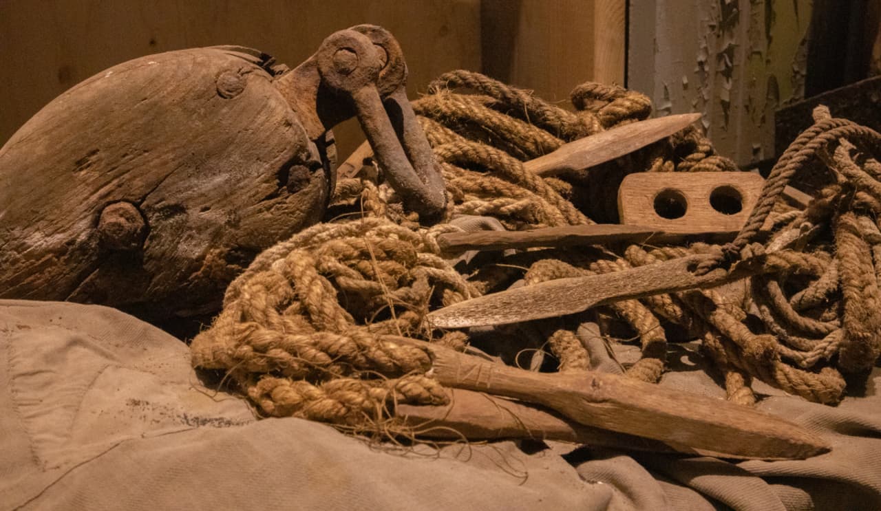Ropes, pulleys, and wooden maritime gear displayed at Skaftfellingur Museum.