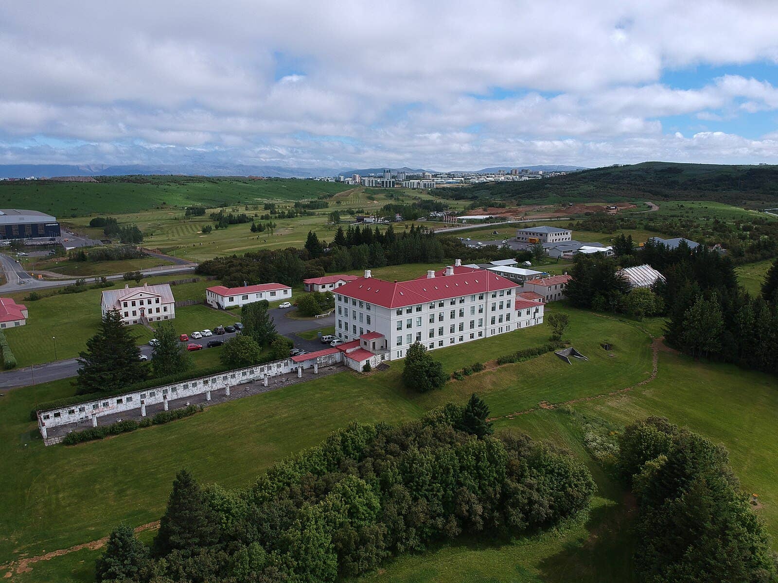 Vífilsstaðir building and parkland beside Vífilsstaðavatn in Garðabær.