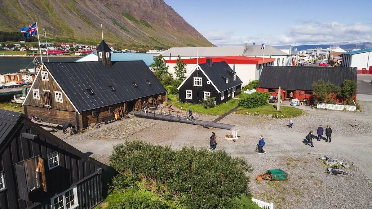 Aerial view of the preserved Neðstikaupstaður harbor buildings in Ísafjörður.