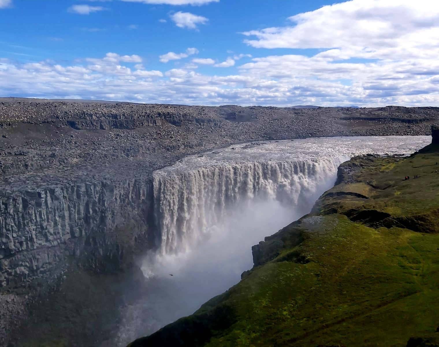 Dettifoss waterfall drops into a canyon on the eastern side of the Diamond Circle.