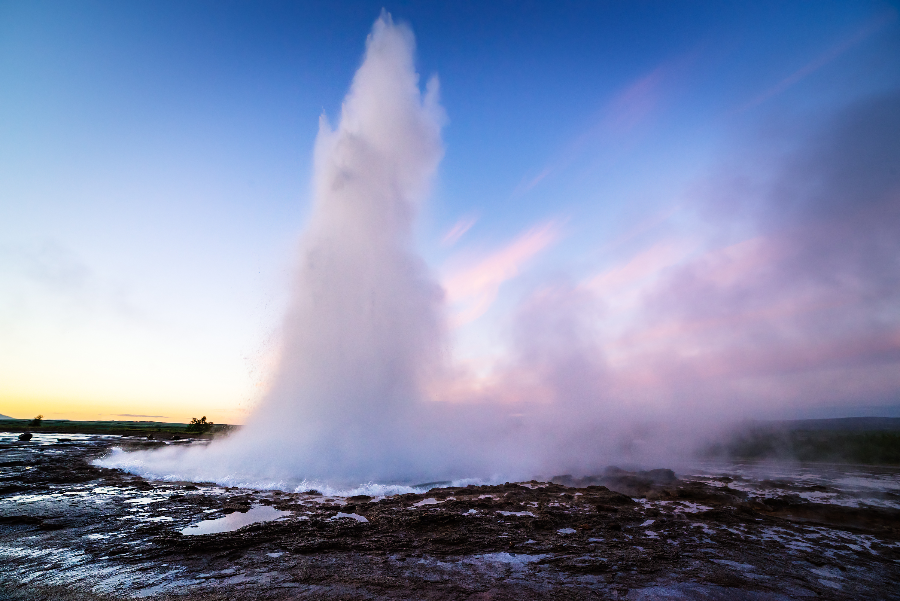 Strokkur geyser erupting at the Geysir geothermal area