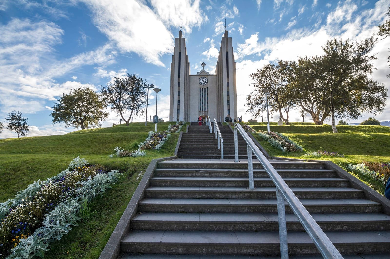 The broad steps rising through planted slopes to Akureyrarkirkja in central Akureyri.