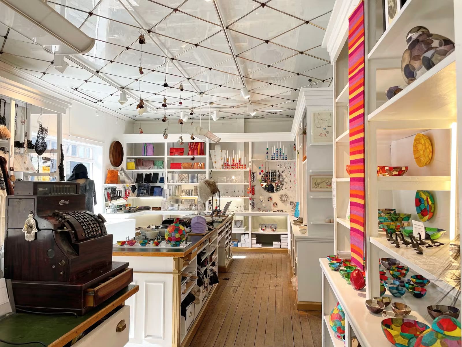 Colorful Icelandic craft and design objects displayed in a bright maker gallery