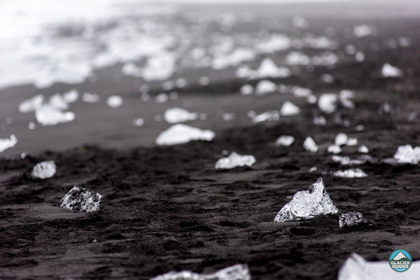 Chunks of glacier ice on the black sand at Diamond Beach beside Jokulsarlon
