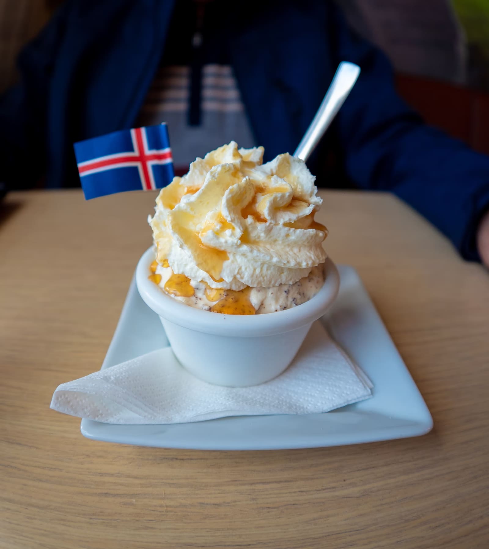 A creamy Icelandic dessert bowl with a small Iceland flag