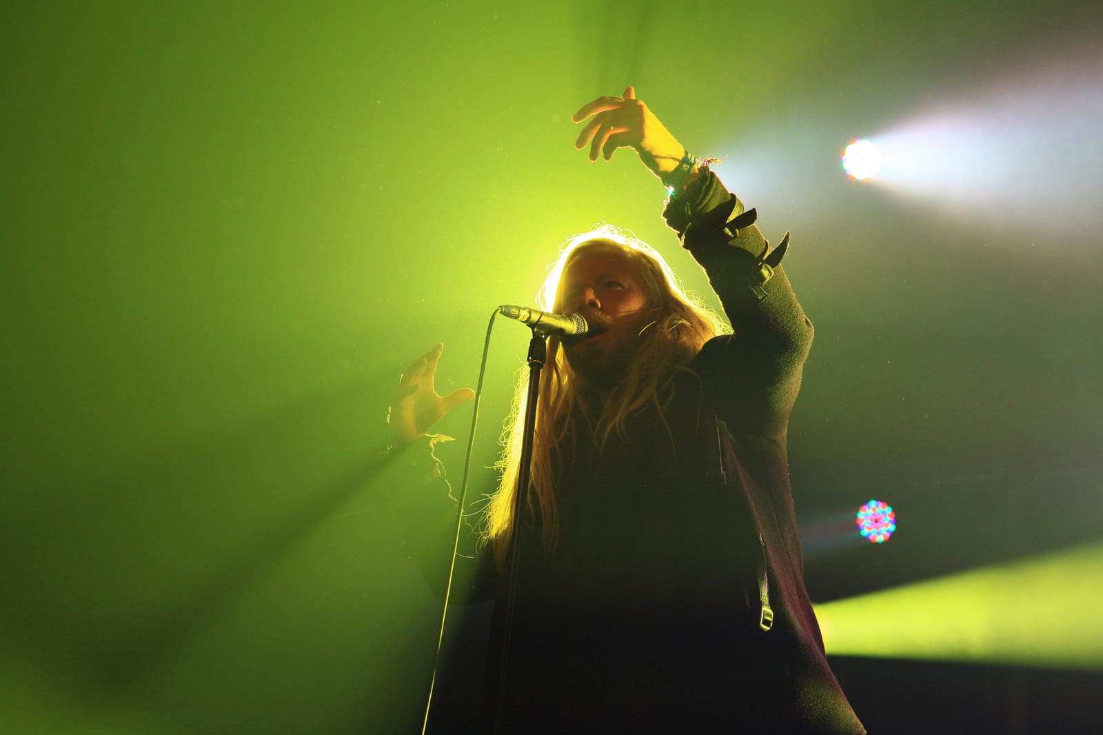 Högni Egilsson performing with GusGus under green lights at Iceland Airwaves in 2012