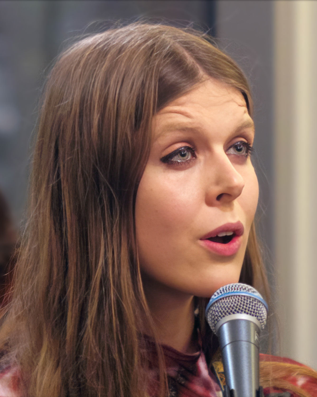 JFDR singing at an Iceland Airwaves off-venue show in Yeoman Boutique in 2023