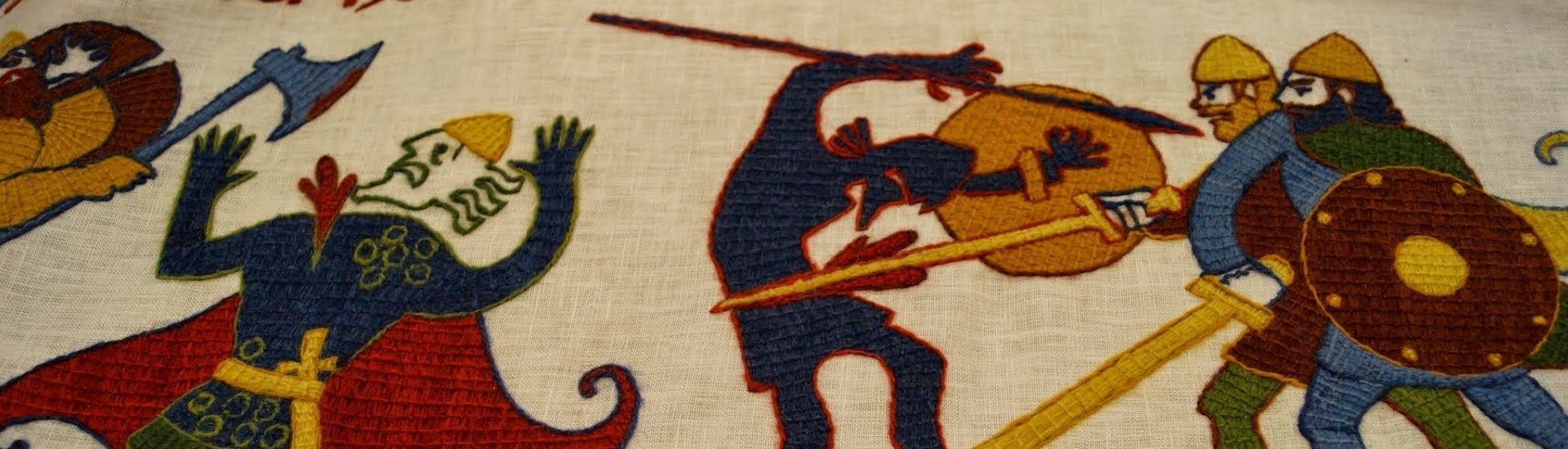 Embroidered Njáls Saga battle scene from the tapestry in Hvolsvöllur