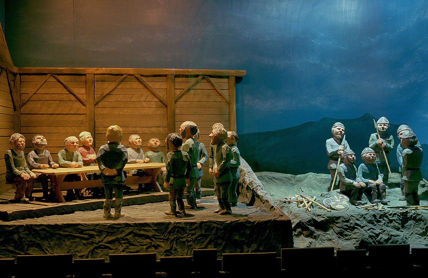 Carved figures in a settlement story display at the Settlement Center in Borgarnes