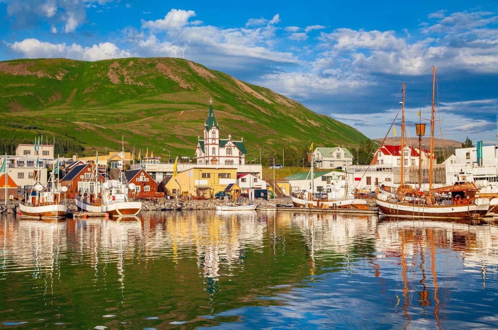 Whale-watching boats in Husavik harbor in North Iceland.