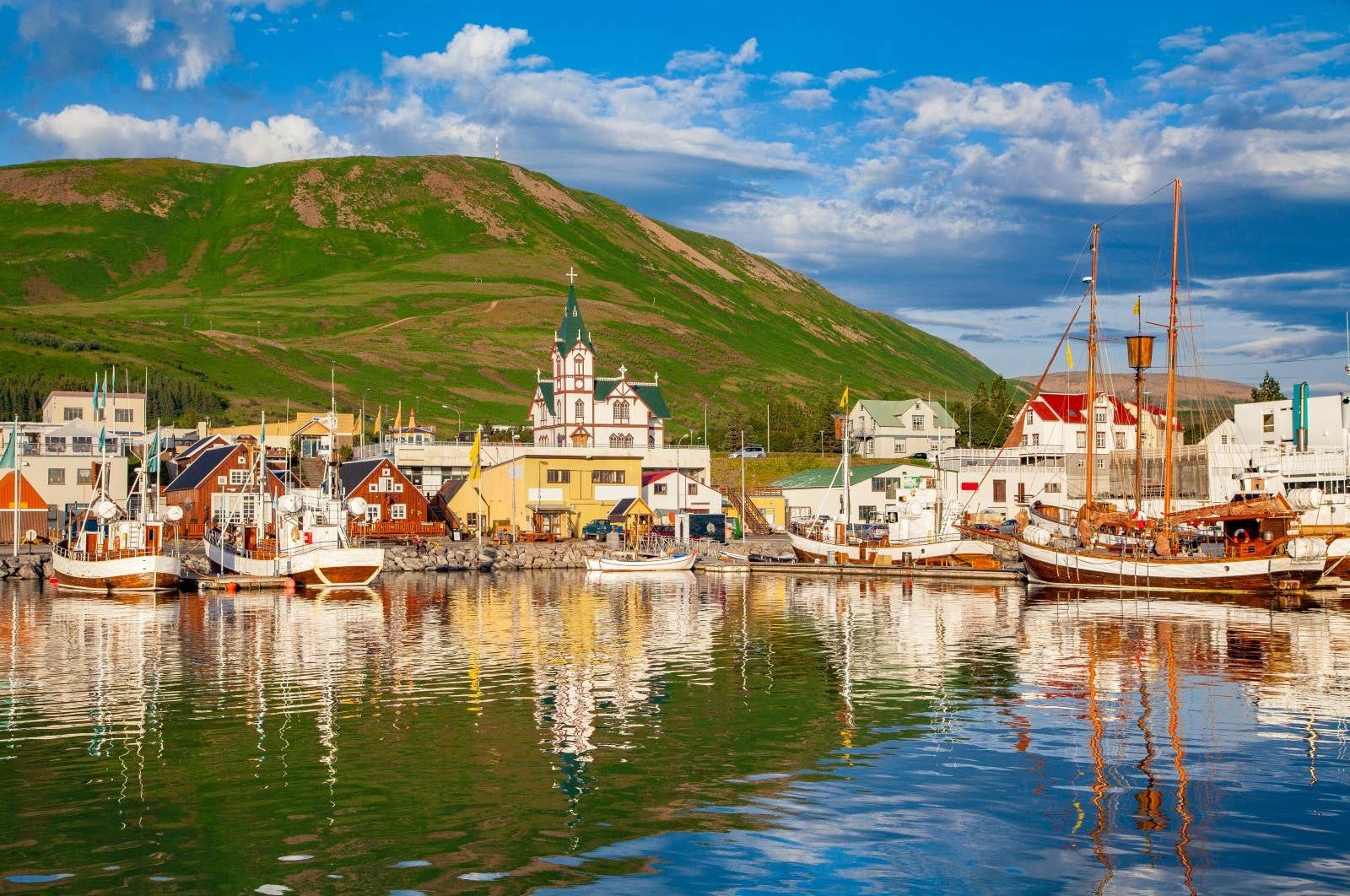 Whale-watching boats in Husavik harbor in North Iceland.