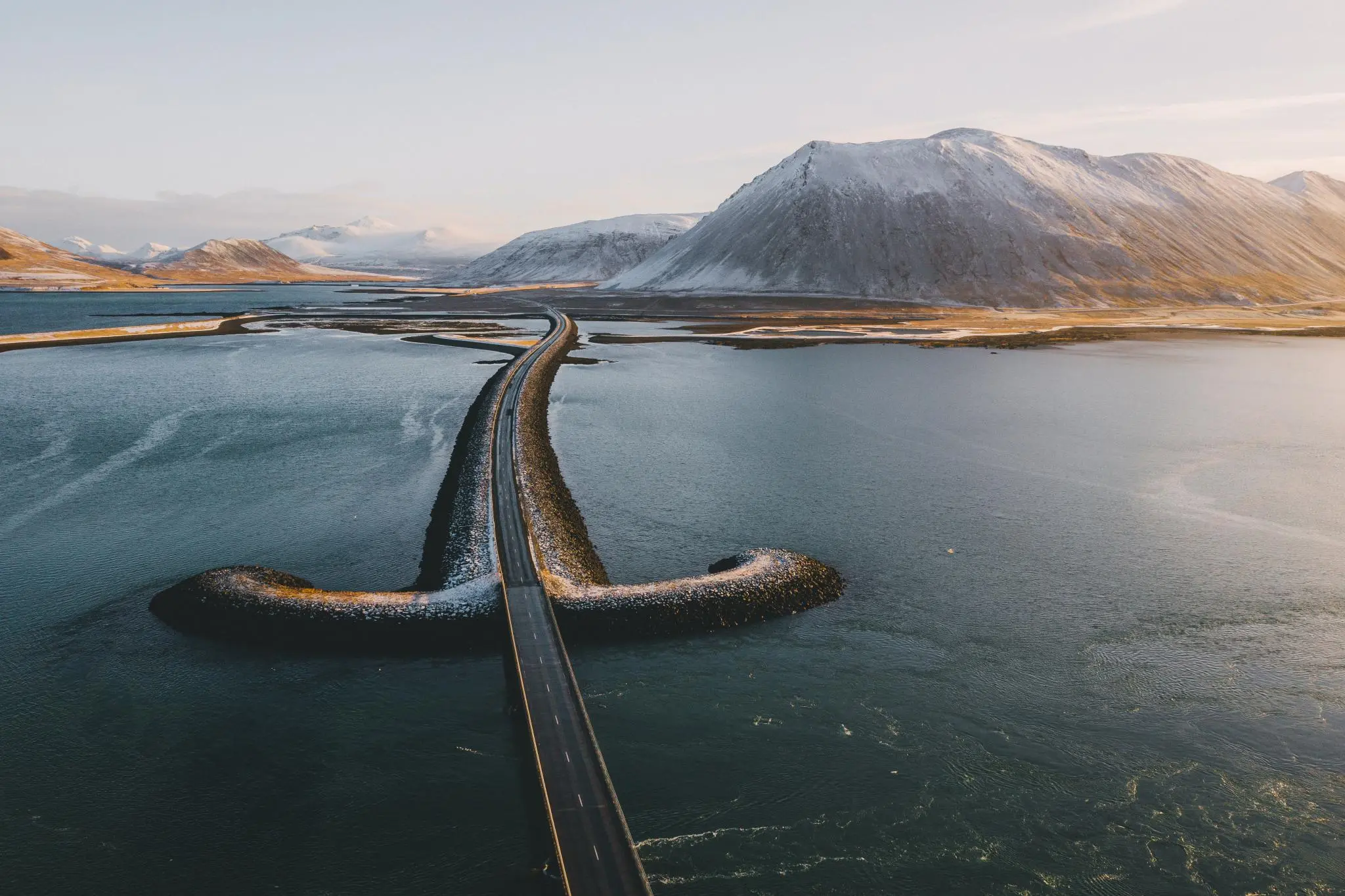 Iceland road crossing an exposed winter landscape during a self-drive route